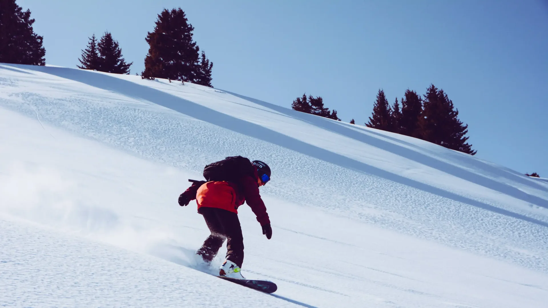 Backcountry skier descending in the Boz-Uchuk valley