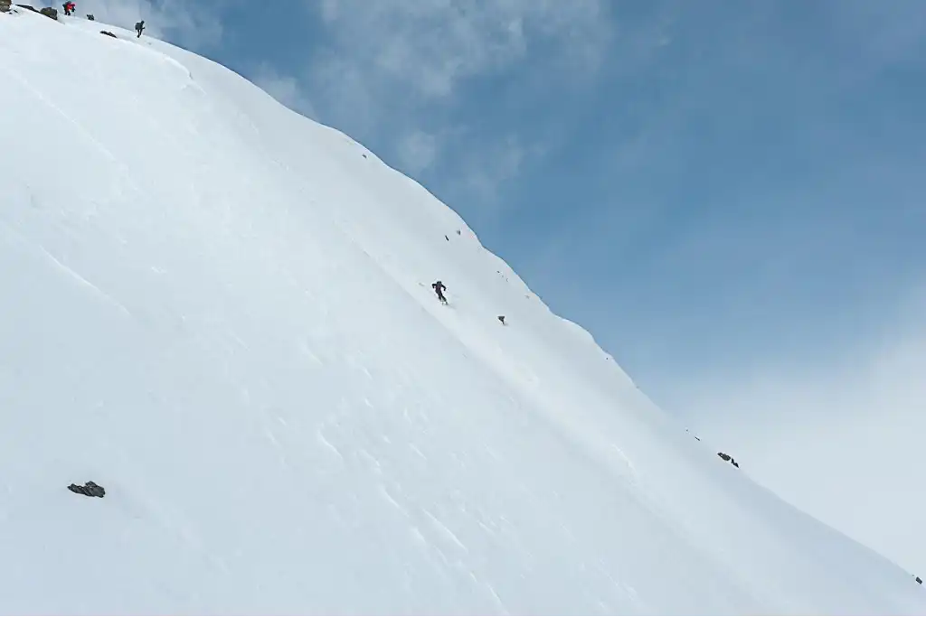 Ski mountaineer on a ridge in the Kyrgyz backcountry