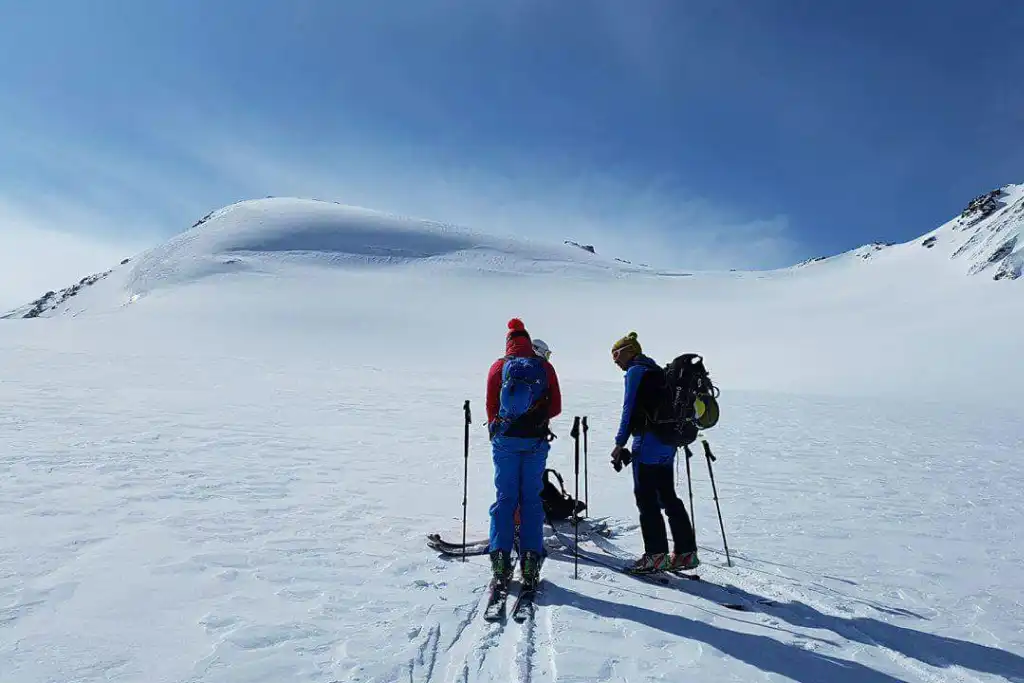 Skier descending a backcountry slope in Kyrgyzstan